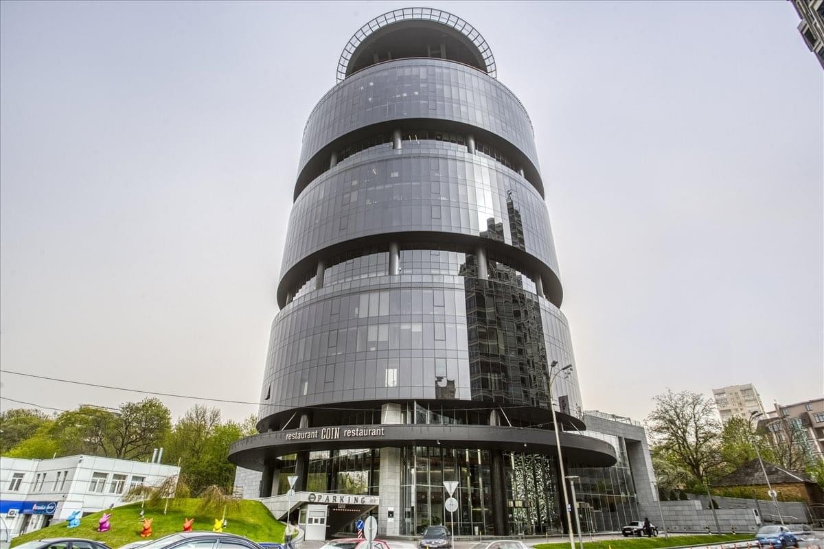 Modern exterior view of the tiered glass-facade IQ Business Centre, 13-15 Bolsunovska Street.
