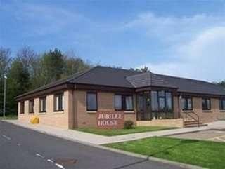 Exterior view of the single-story brick building at Jubilee House, Saltire Centre.