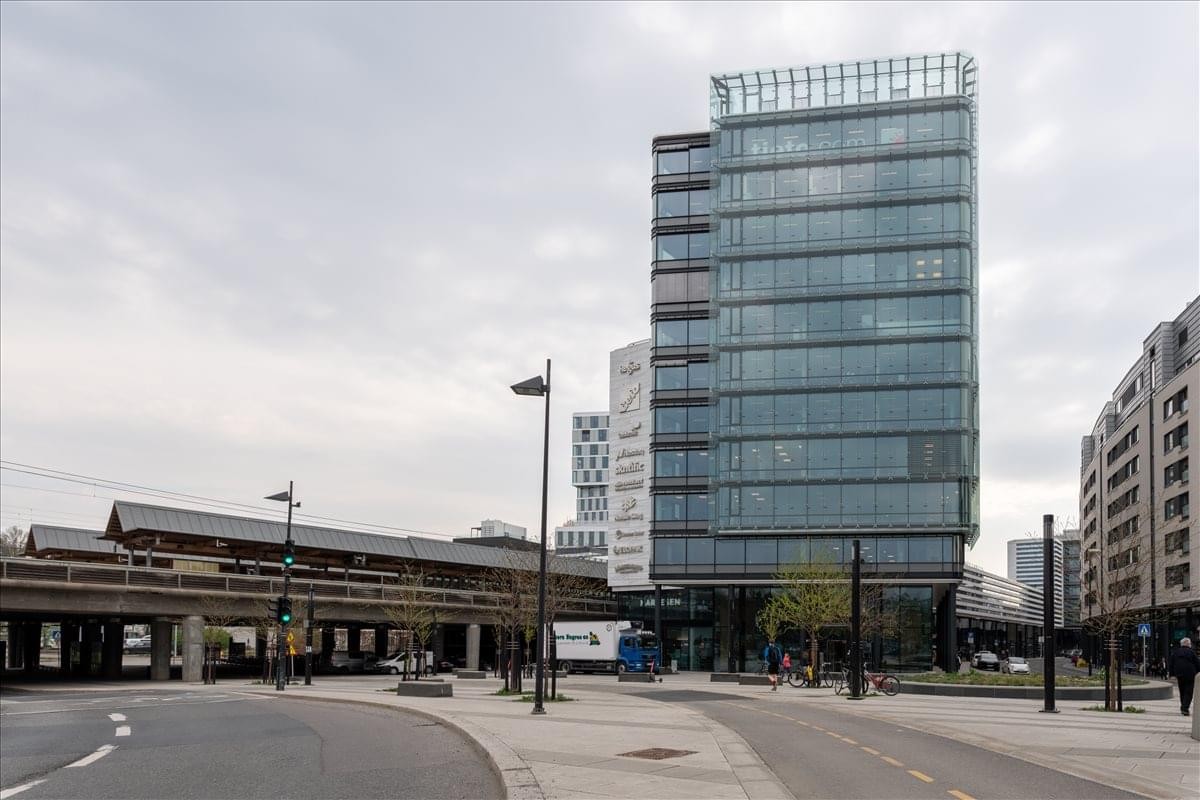Exterior view of the modern glass-facade building at Karenslyst Allé 49-53.