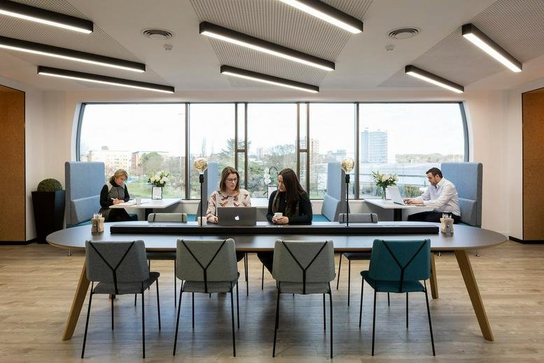 Spacious coworking lounge with diverse seating at Kings Court Business Centre, London Road, Stevenage.