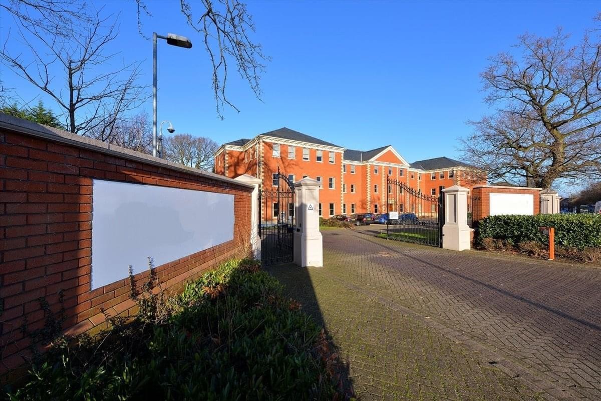 Exterior view of the red brick facade and entrance at Kingsley Hall, Bailey Lane.