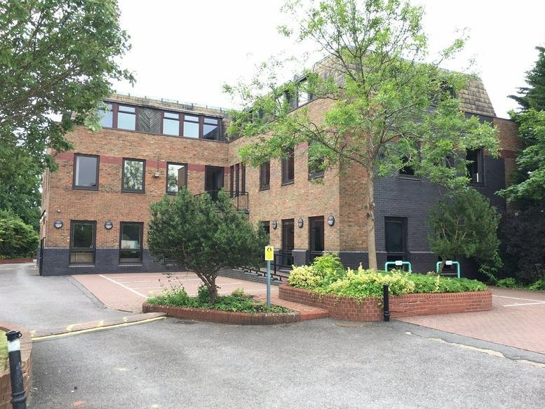 Exterior view of the brick facade at Landmark House, 1 Station Road.