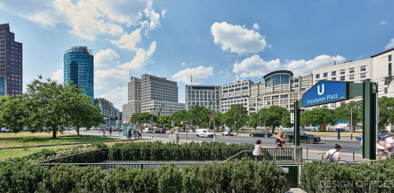 Bright exterior view of the modern architecture and green spaces at Leipziger Platz 16, Berlin.