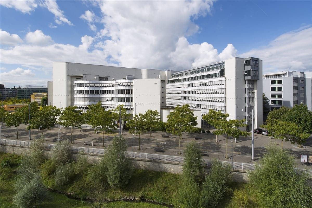 Exterior view of the modern, multi-story facade of Leutschenbachstrasse 95, The World Trade Centre.