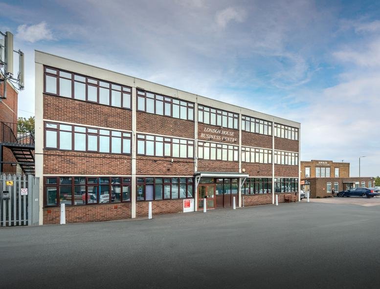 Exterior view of the brick facade of London House Business Centre, Texcel Business Park.