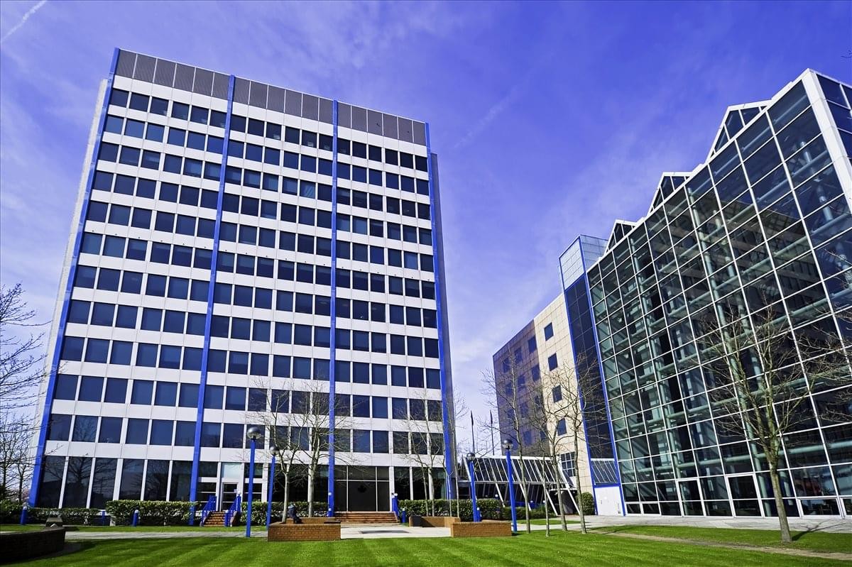 Exterior view of the modern glass and steel facade at Maple House, High Street, Potters Bar.