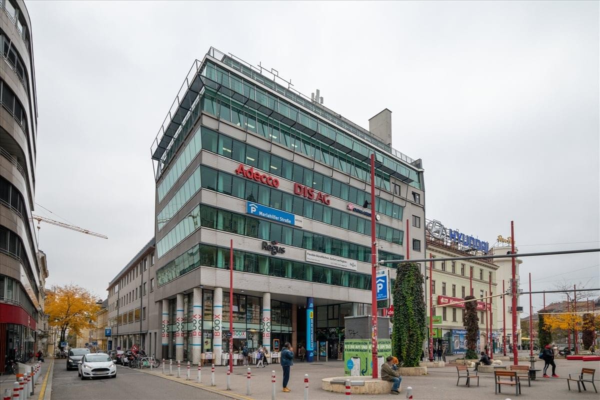 Exterior view of the glass-facade Mariahilfer Strasse 123, Vienna, Austria building.