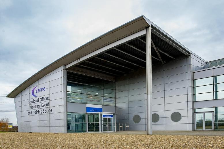 Entrance of the CEME Business Campus building with modern architecture.
