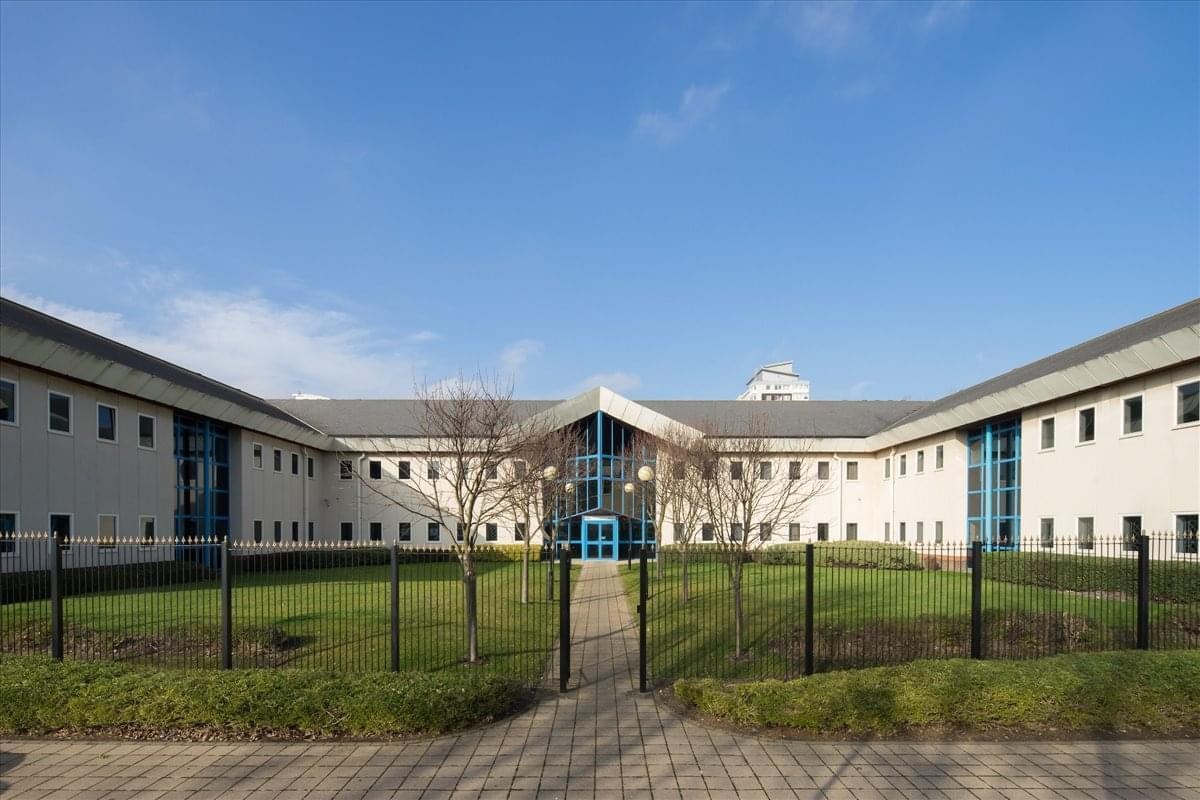 Exterior view of the white facade and central entrance at North Sands Business Centre.
