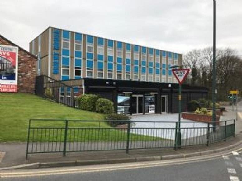 Exterior view of the multi-story Orient House Business Centre with its blue and grey panelled facade.