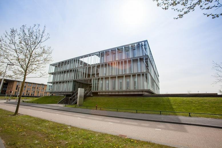 Exterior view of the modern glass-facade building at Orteliuslaan 850, Utrecht.