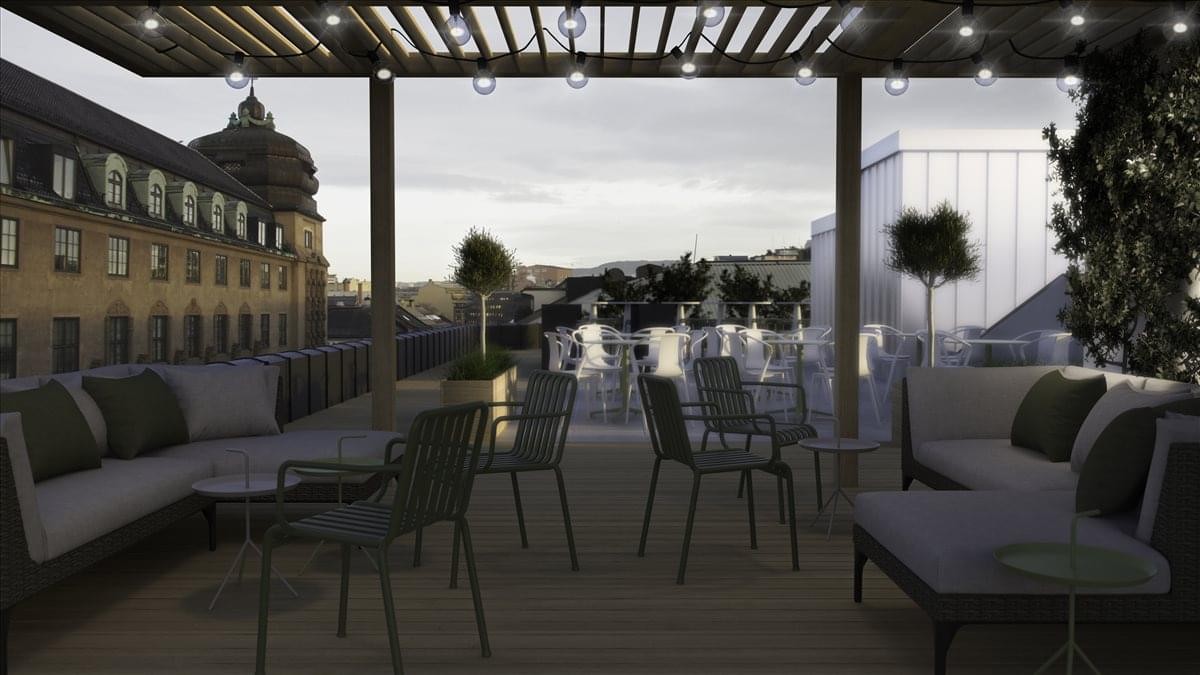 Rooftop terrace at Oslo Kvadraturen, Tollbugata 8 with lounge seating and city dome views.