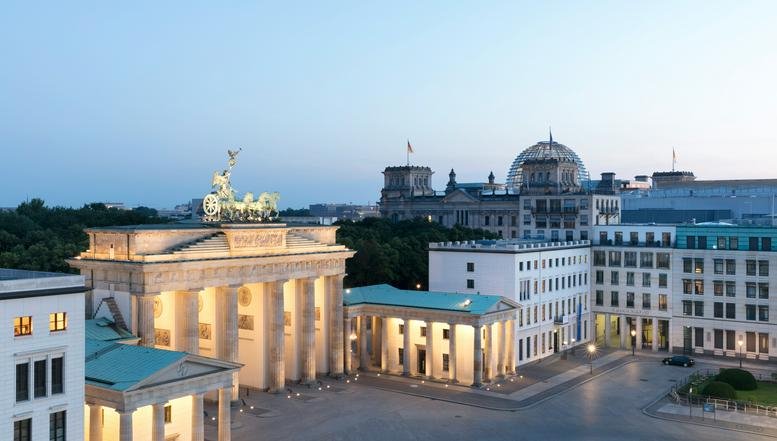 Aerial view of the historic Brandenburg Gate and surrounding buildings at Pariser Platz 6a.