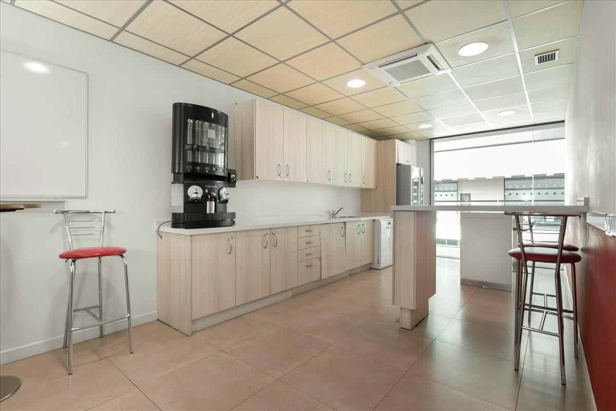 Modern breakroom kitchen at 5th Floor, Plaza de La Solidaridad 12, Malaga, Spain.