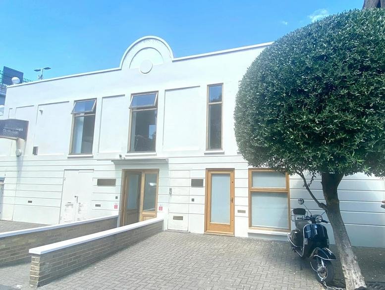 Exterior view of the white facade building at Ranelagh Gardens, Fulham, London, SW6, UK.