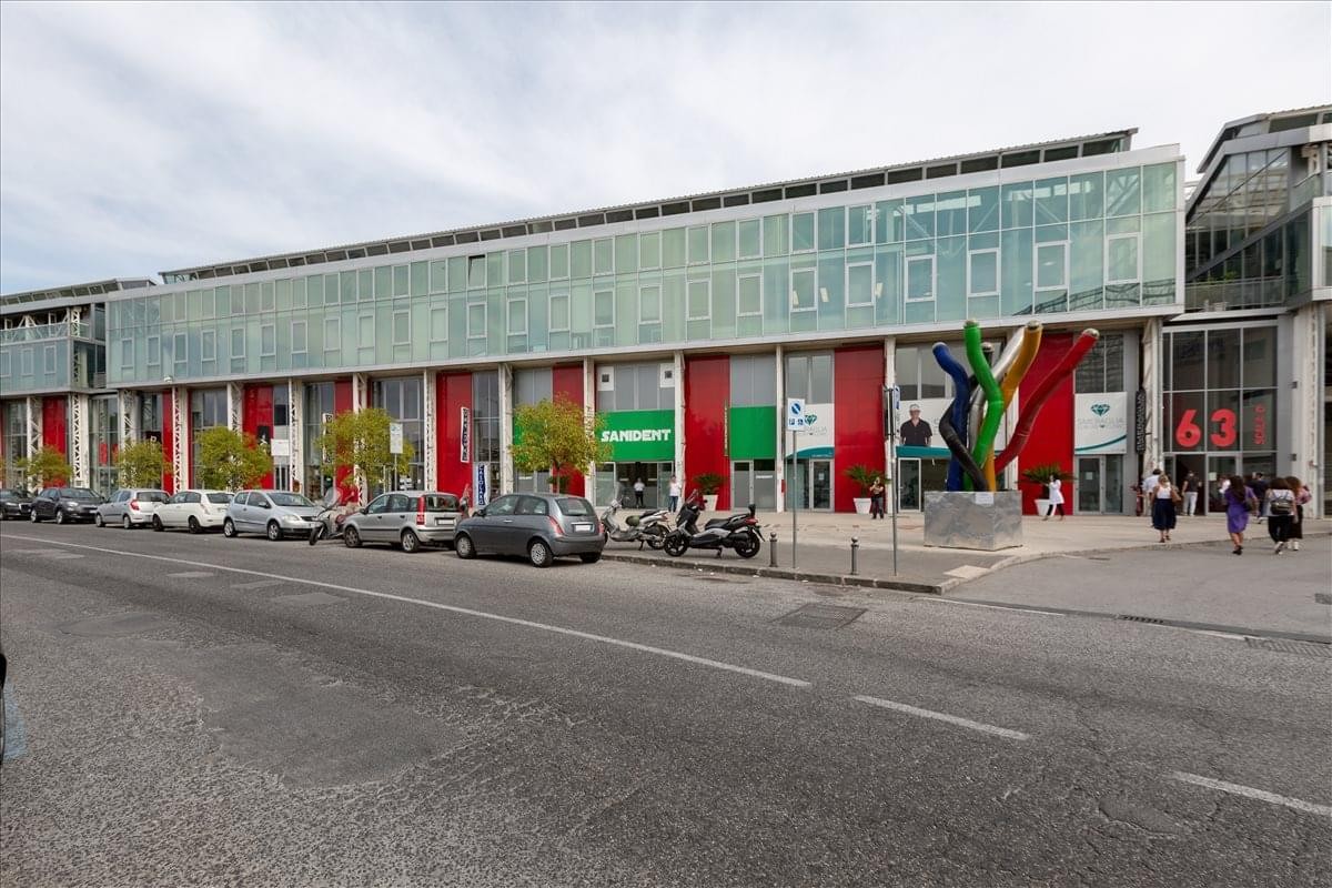 Exterior view of the modern glass-facade building at Regus, Via Benedetto Brin 69, 80142 Naples.