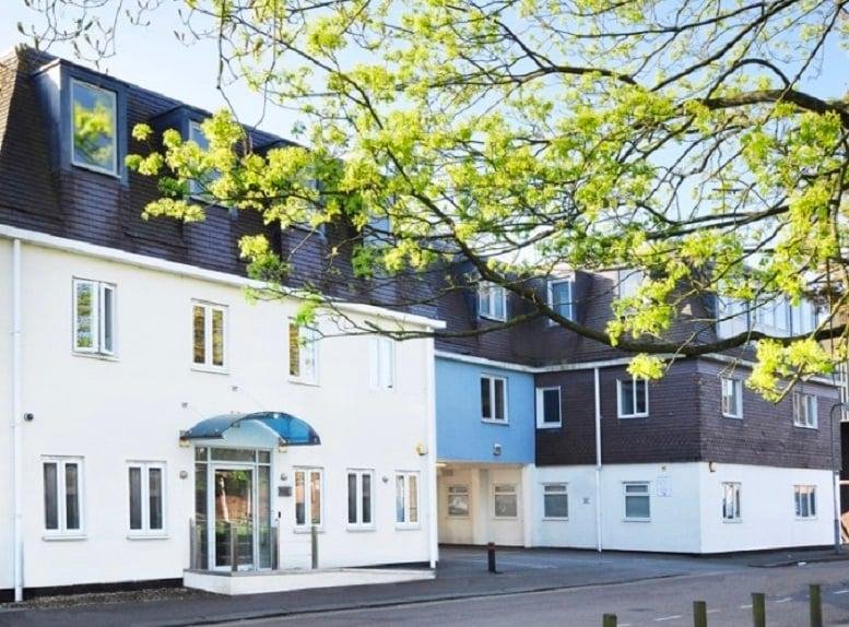 Exterior view of the white and dark-clad building at River Lawn Road, Tonbridge, Kent.