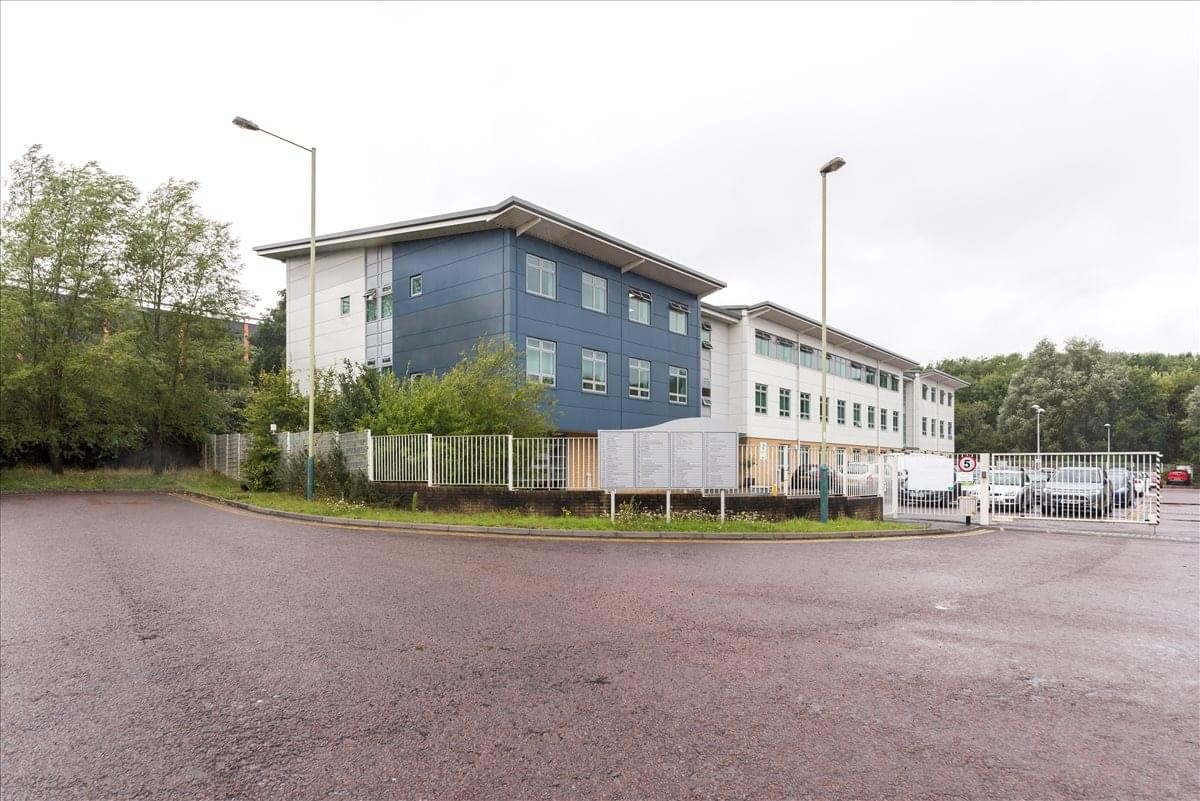 Exterior view of the modern blue and white office building at Rivermead Drive, Westlea.