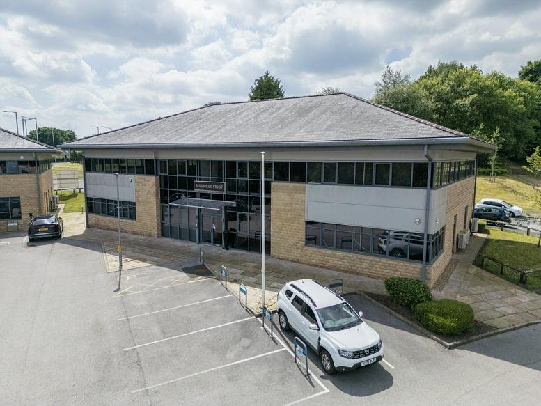 Aerial exterior view of the modern two-story Vantage Court, Riverside Way office building.
