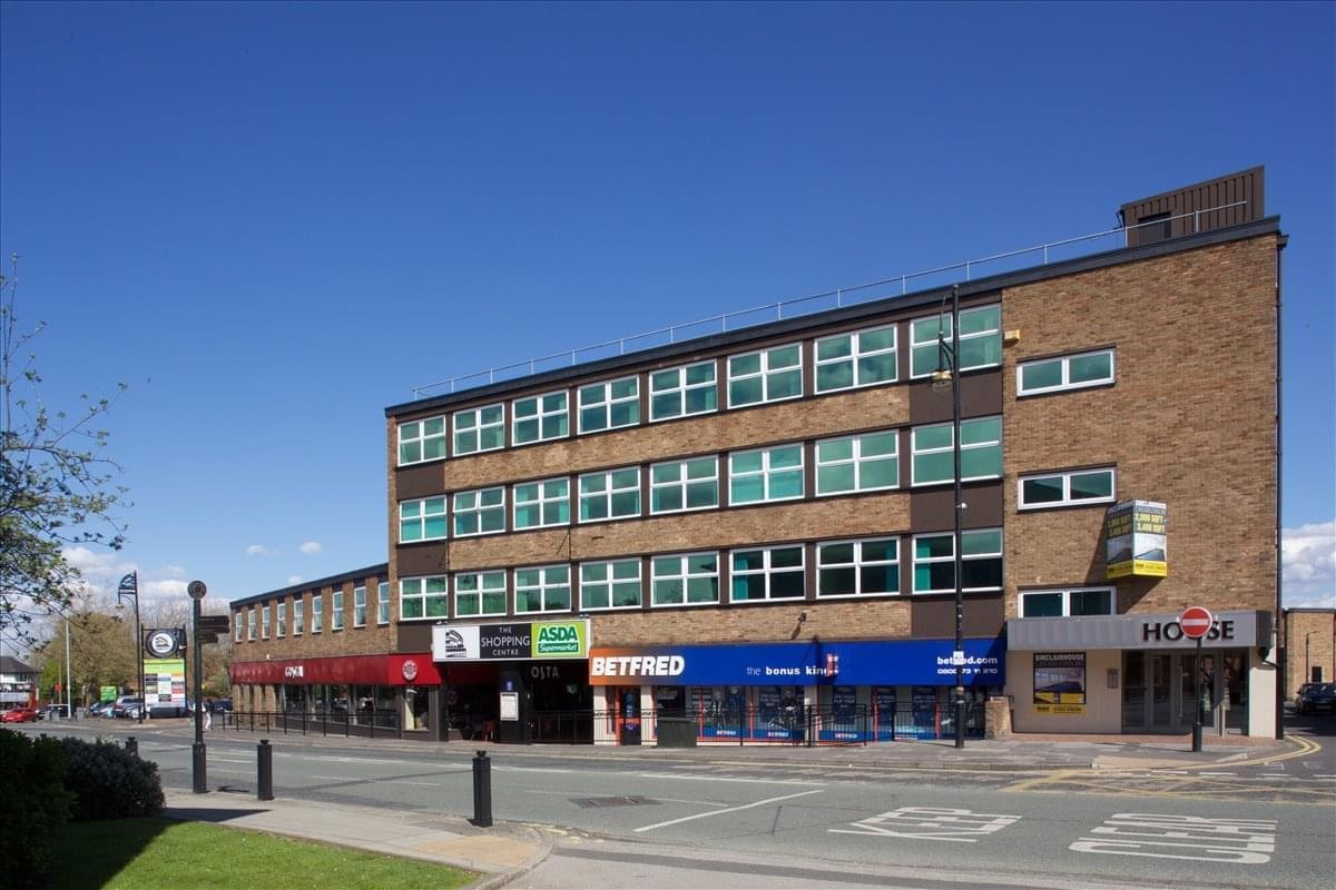 Exterior view of the brick facade at Sinclair House, Station Road, Manchester.
