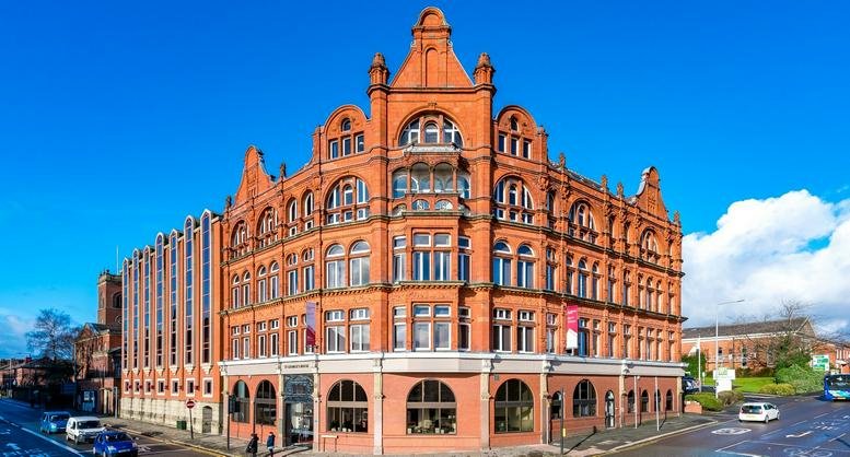 Exterior view of the ornate red brick facade at St George’s House.