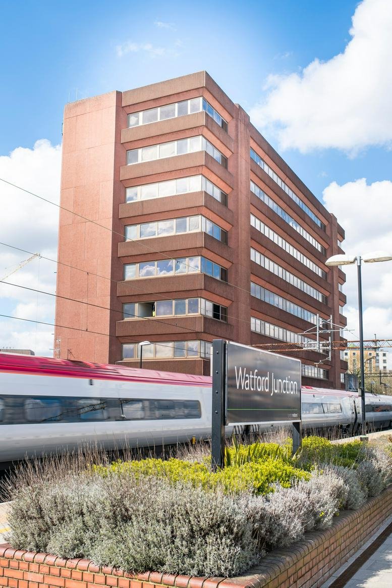 Exterior view of the brick facade at The Junction, Station Road, Watford Junction.
