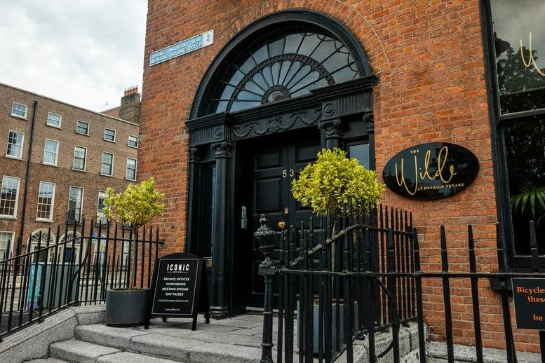 Exterior view of the brick facade and arched doorway at The Wilde, 53 Merrion Square South.
