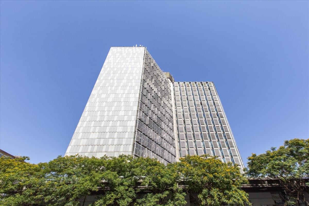 Exterior view of the Garibaldi Centre skyscraper under a clear blue sky.