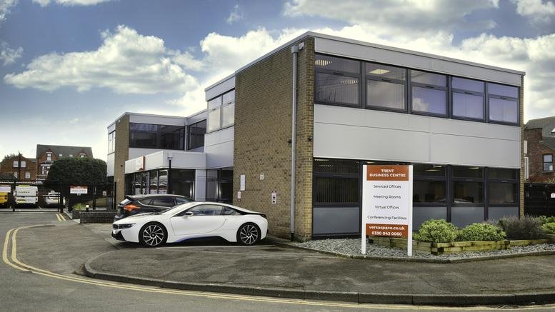 Exterior view of the contemporary white and brick facade at Trent Business Centre.