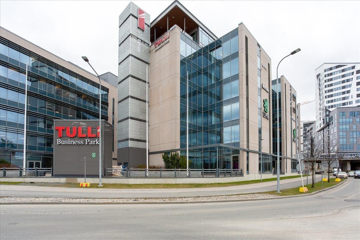 Exterior view of the modern glass and stone facade at Tulli Business Park.