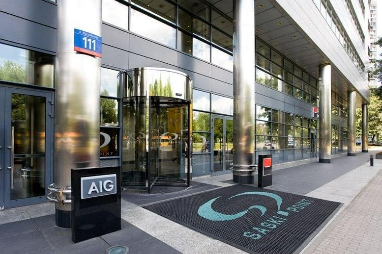Exterior entrance of the modern Saski Point building at ul. Marszałkowska 111.