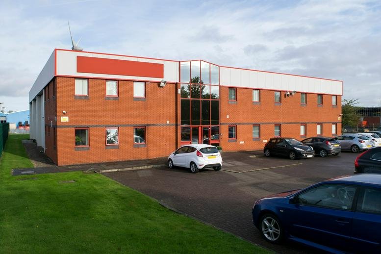 Exterior view of the brick facade at Unit 2, Paddock Road, Skelmersdale, Lancashire.