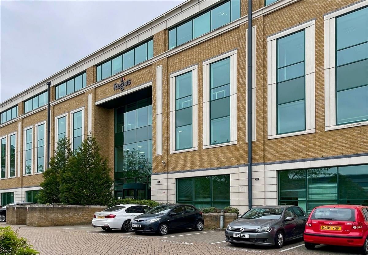 Exterior view of the brick and glass facade of Venture House, Arlington Square, Bracknell, Berkshire.