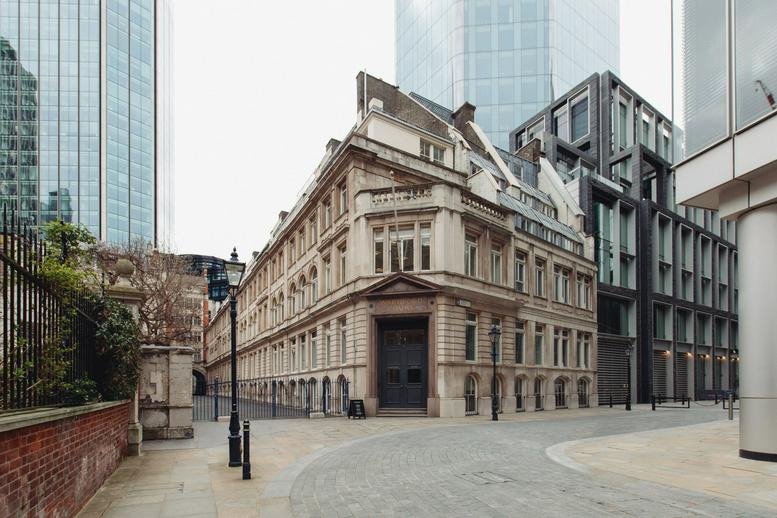 Exterior facade of Warnford Court, 29 Throgmorton Street, featuring classical architecture and a grand entrance.