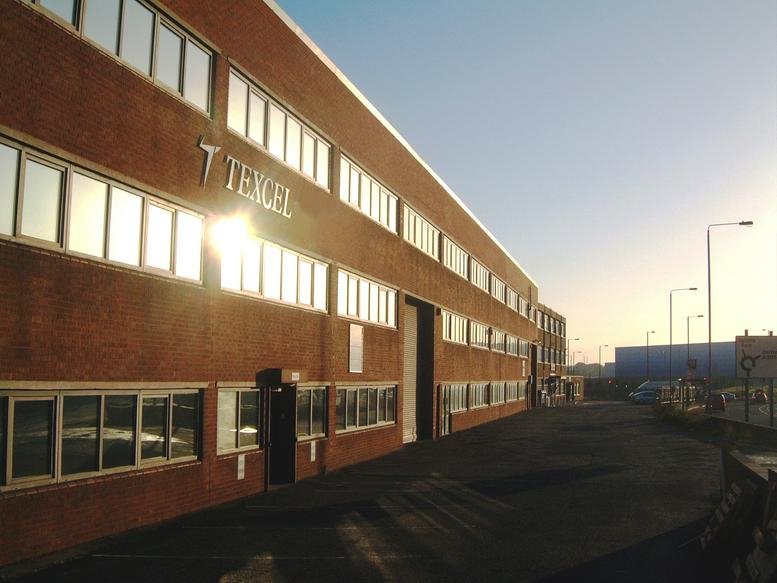 Exterior view of the brick facade at Water House Business Centre, Texcel Business Park.