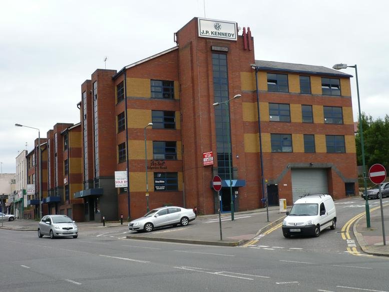 Exterior view of the brick facade at Watling Gate, 297-303 Edgware Road.