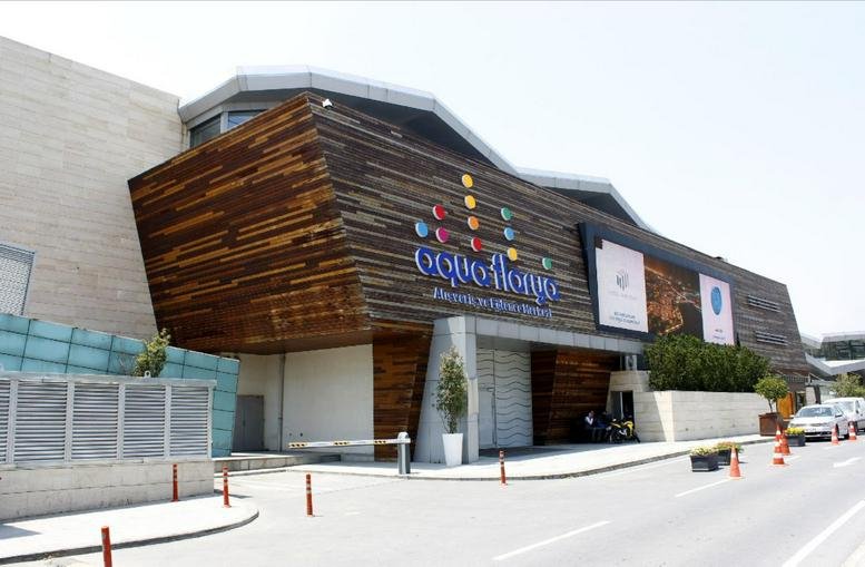 Exterior view of the wooden and glass facade at Aqua Florya.