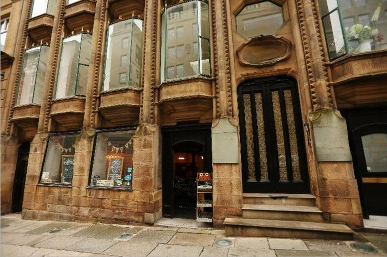 Exterior view of the ornate stone facade of Oriel Chambers, Water Street.