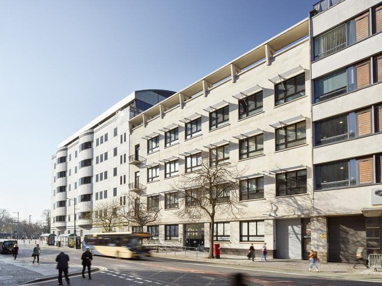 Exterior view of the multi-storey stone and glass facade of Park House.