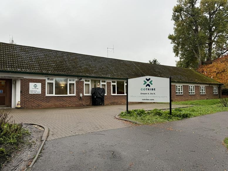 Exterior view of the brick facade and entrance at Park house, Randalls Rd.