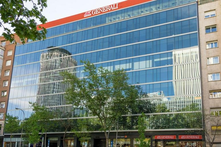 Exterior view of the glass-facade Paseo de la Castellana, 130 office building in Madrid.