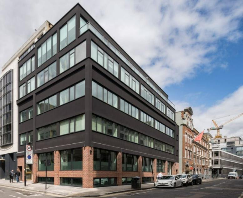 Modern black and brick exterior of the Paul Street, London, United Kingdom office building.