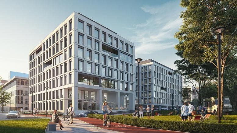 Exterior view of the modern glass and stone building at Pilsudskiego 24, Lodz, Poland.