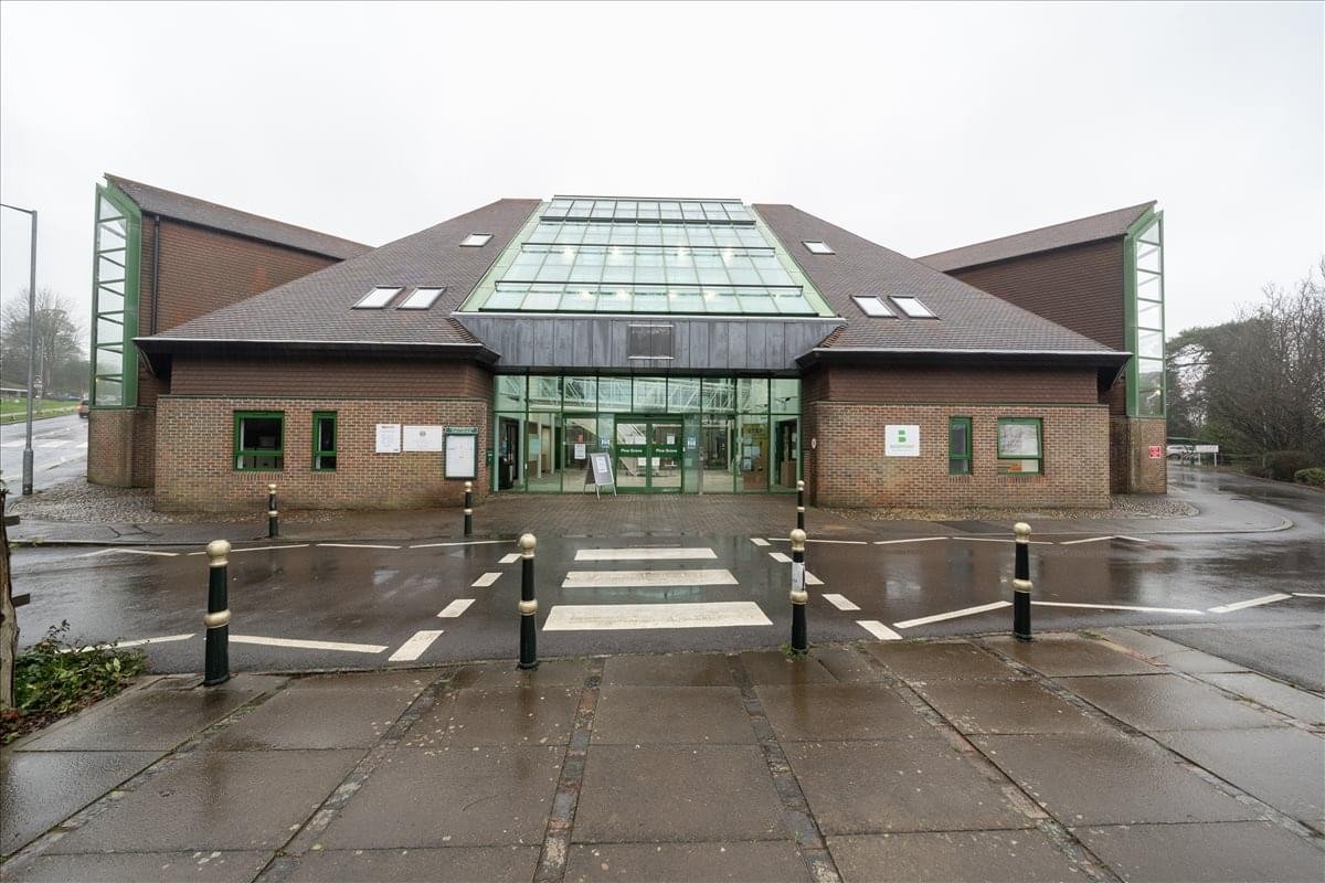 Exterior view of the contemporary brick and glass building at Pine Grove, Crowborough.