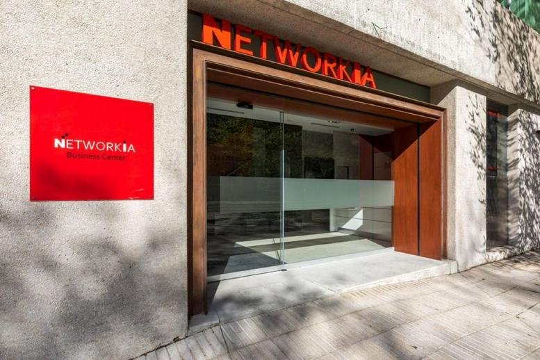 Exterior entrance of the Networkia building at Poeta Joan Maragall 23, Madrid.