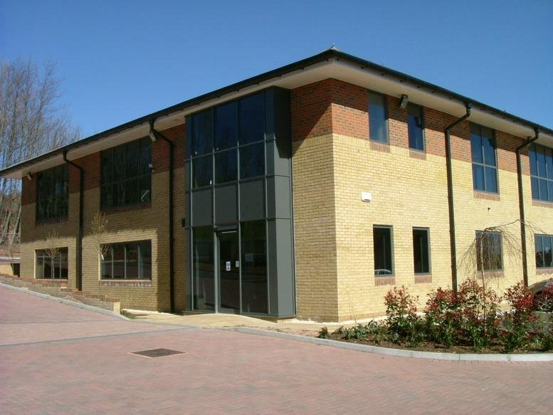 Exterior view of Galahad House on Priory Drive with brick facade and large windows.