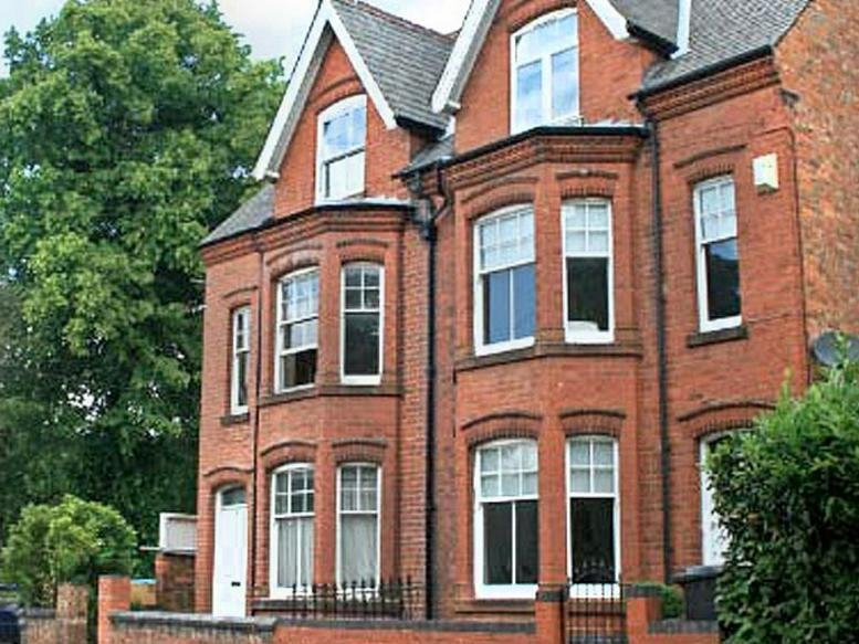 Exterior view of the red brick facade of Regent Court, 42 Regent Place.