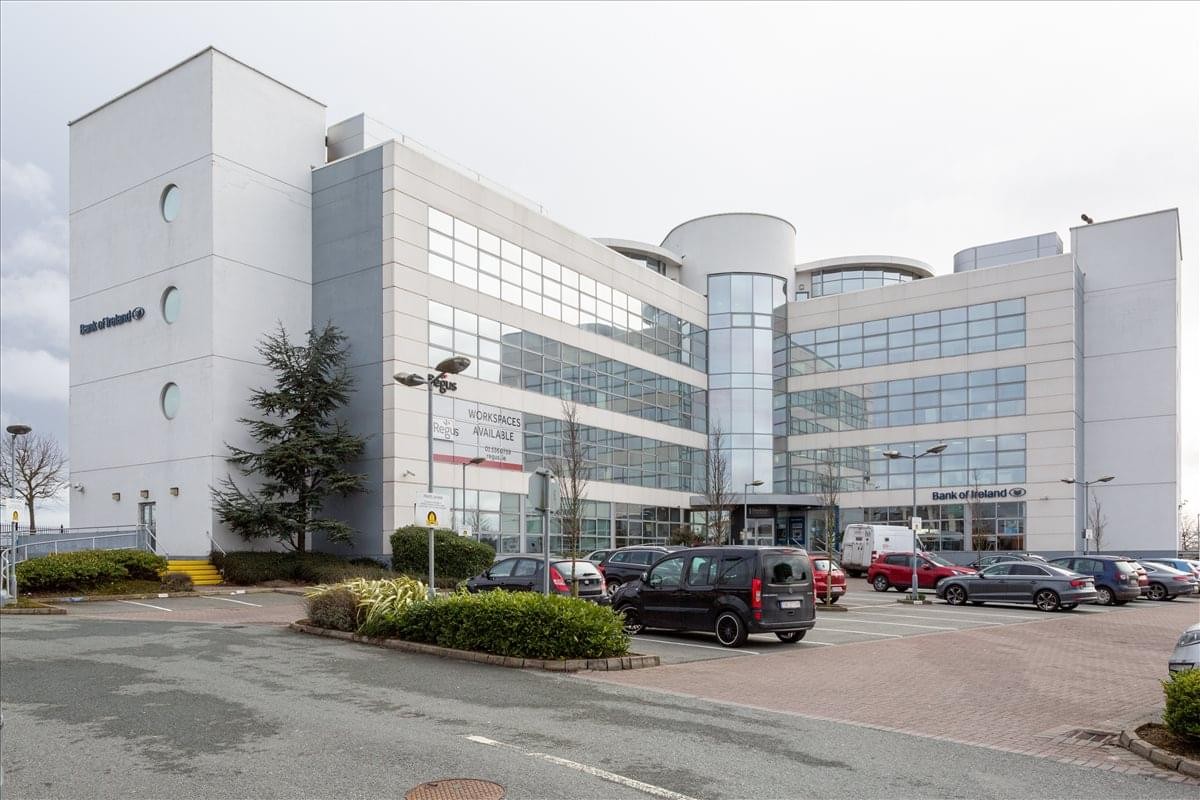 Exterior view of the modern glass and stone facade at Regus Block 1, Blanchardstown Corporate Park.