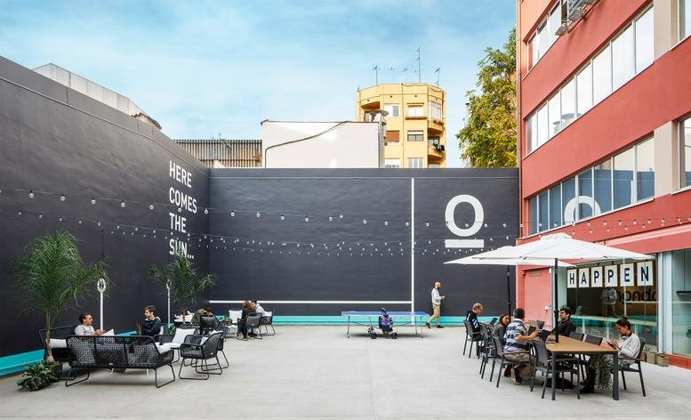 Spacious outdoor courtyard with seating at Riera de Sant Miquel 1 BIS, Barcelona.