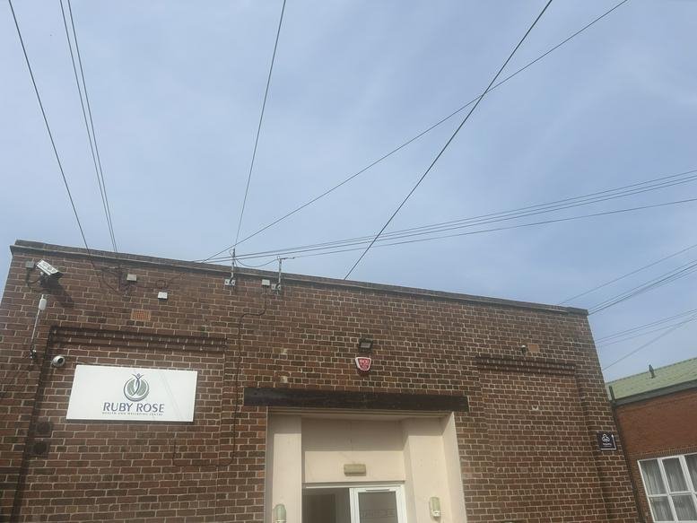 Exterior brick facade of Unit 3a Unicorn Business Park, Ripley (Derbyshire) with company signage.